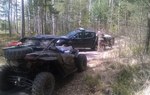 Zdjęcia z akcji. Pojazd - quad stoi na leśnej ścieżce/ Fot. Łukasz Jóźwik